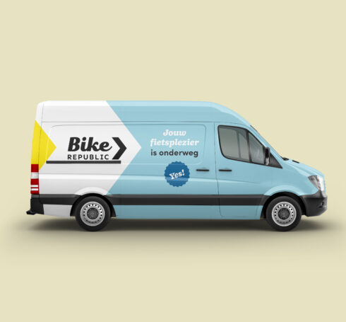 A van in the Bike Republic branding with yellow, light blue and white background.