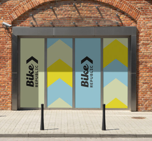 Outside window banners for Bike Republic in the new blue yellow branding.
